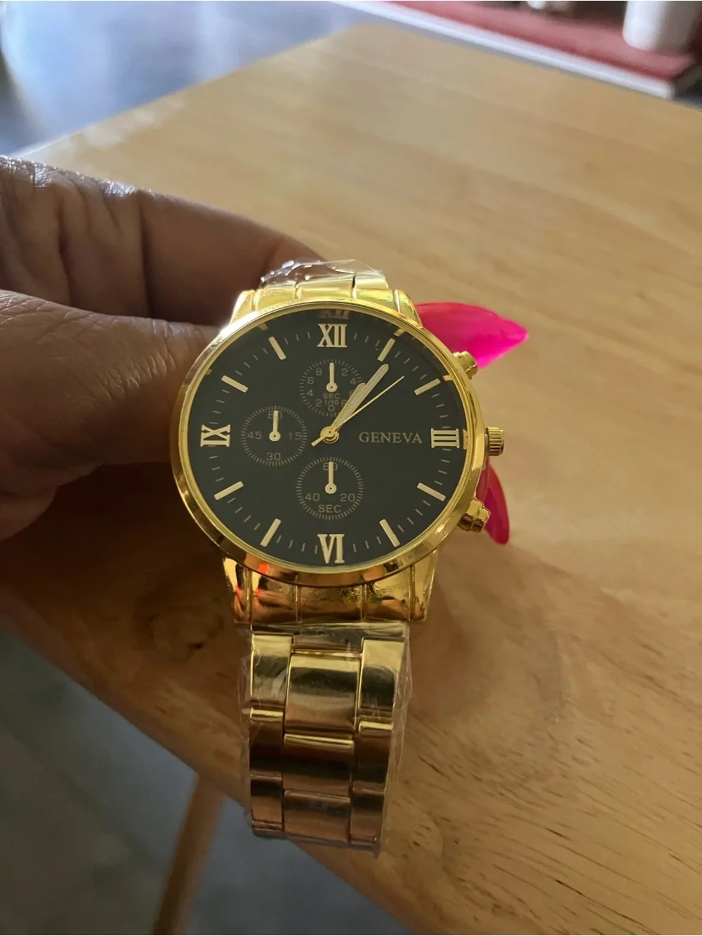 Geneva Gold Tone Watch with Black Dial